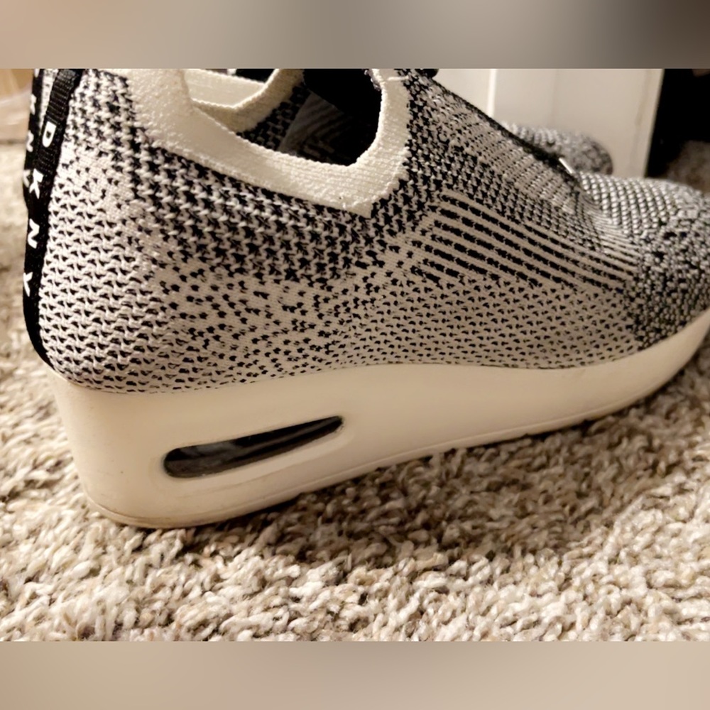 DKNY Shoes. 6 1/2 black and white. Zip up.